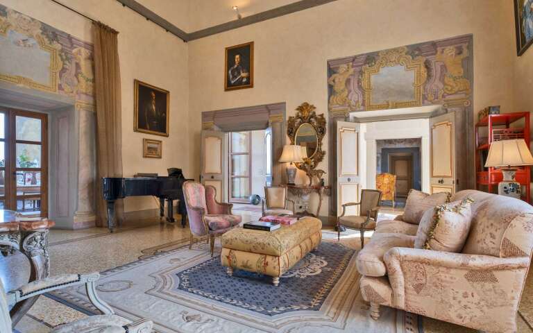 picturesque living room with piano