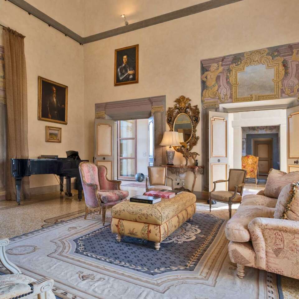 picturesque living room with piano