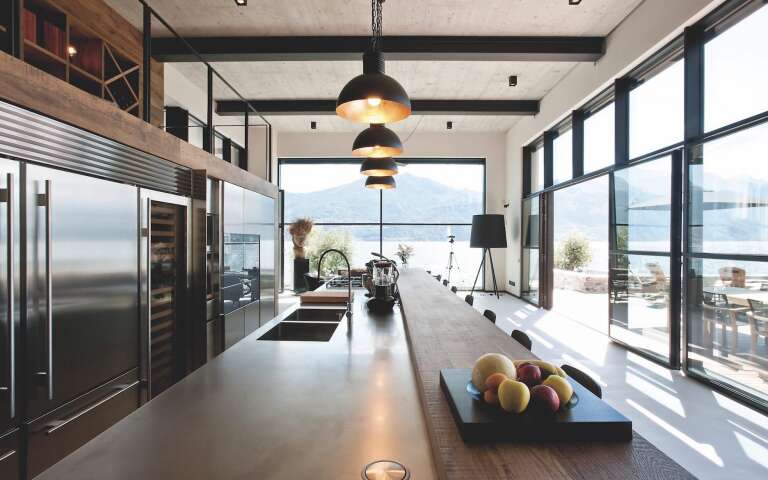 contemporary kitchen island and view over Lake Como