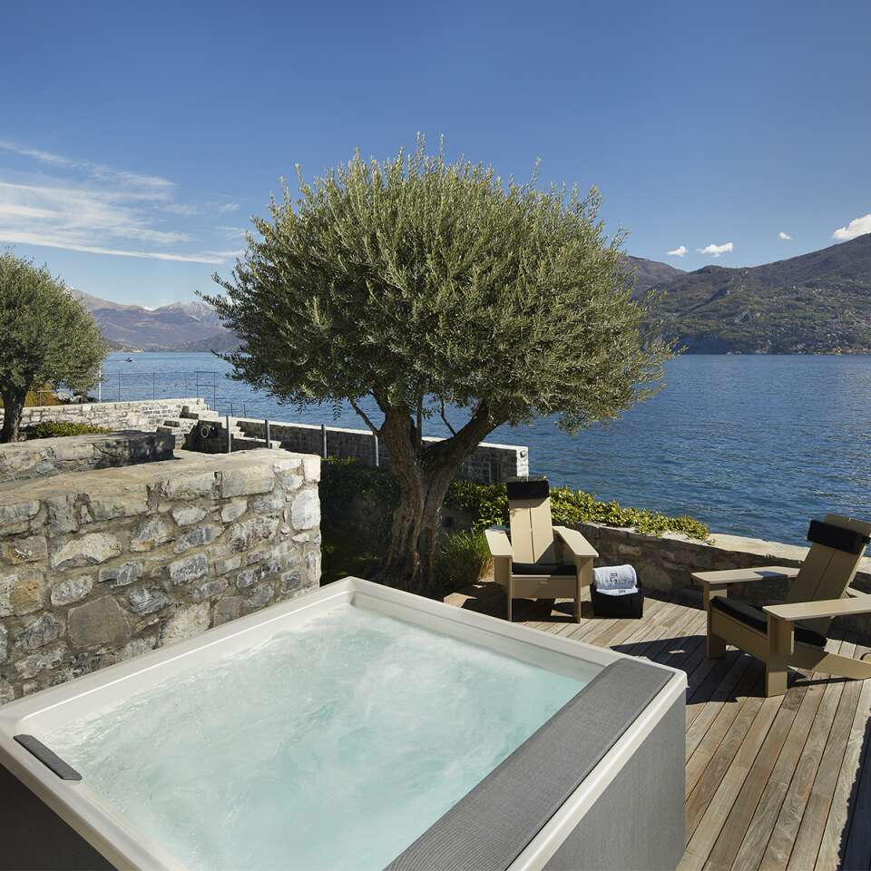 outdoor Jacuzzi with lake view