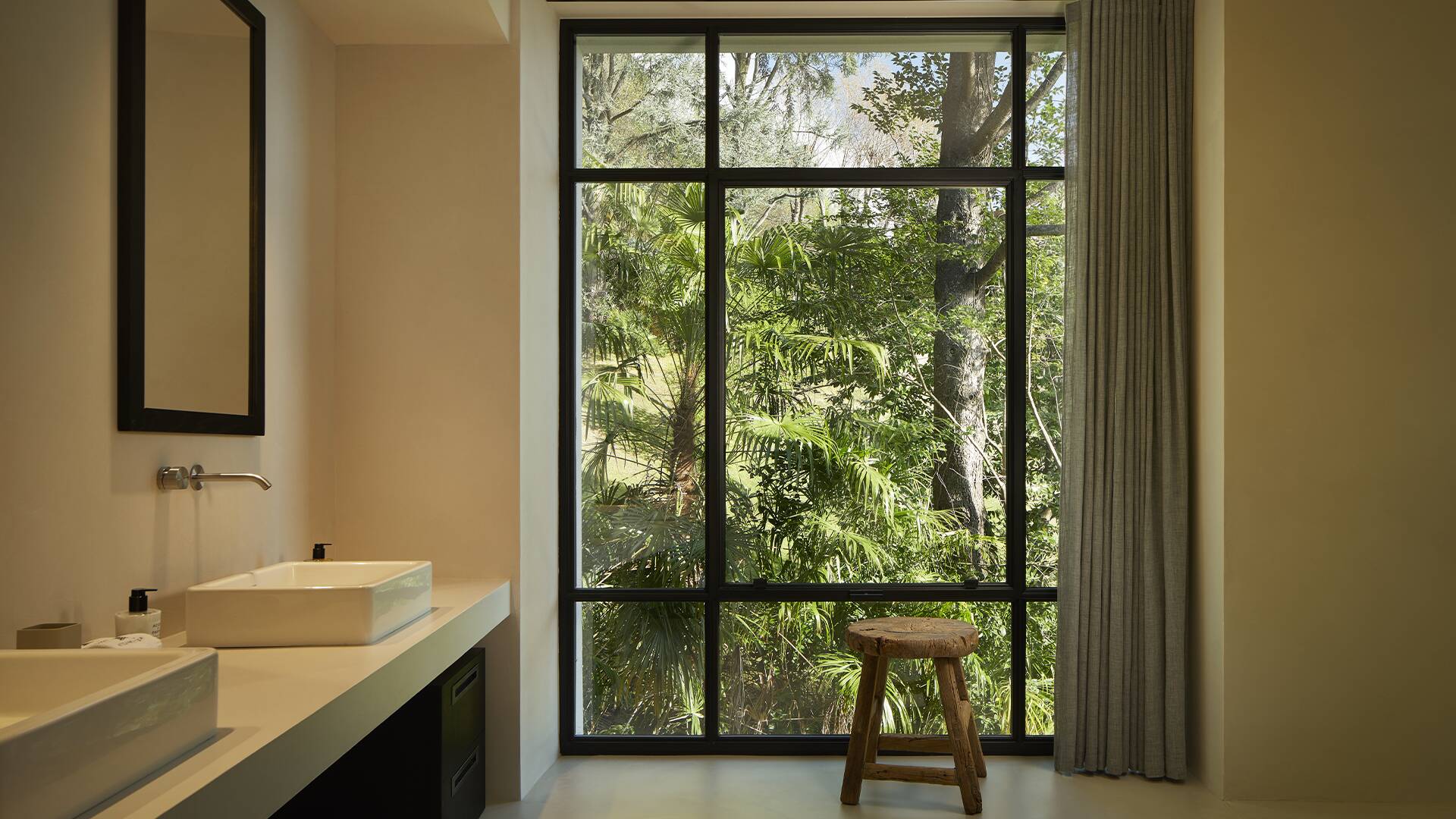 elegant bathroom with floor-to-ceiling window