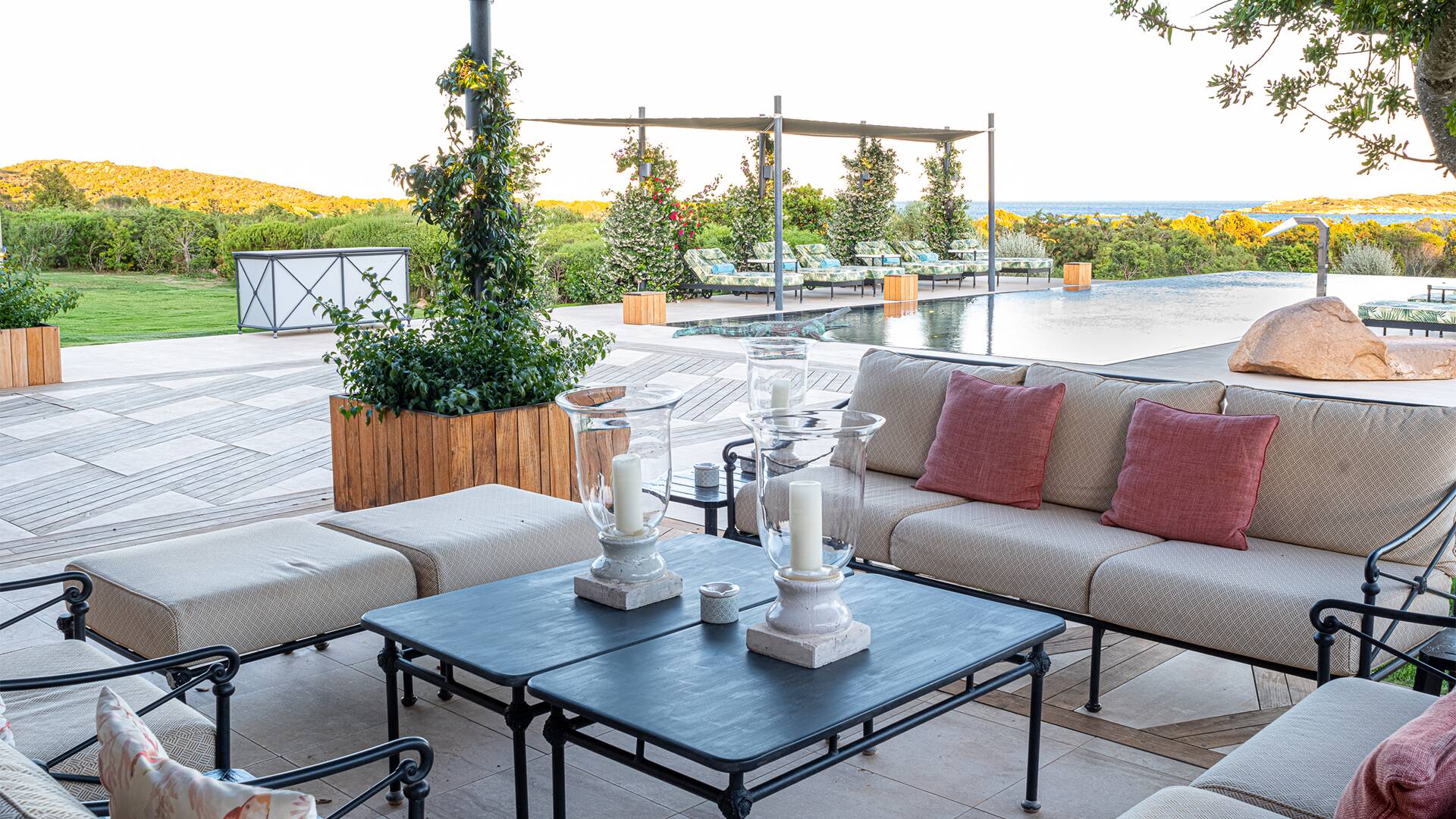 covered sitting area by the pool