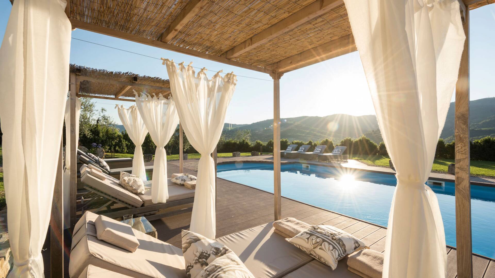 private pool with sunbathing area and gazebo