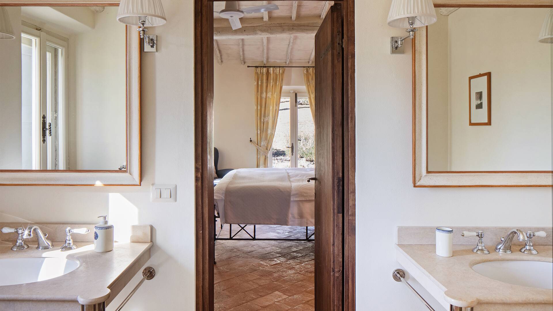 en suite bathroom with double lavabo