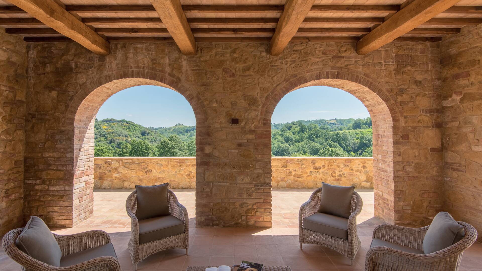 covered terrace on the ground floor equipped with lounges