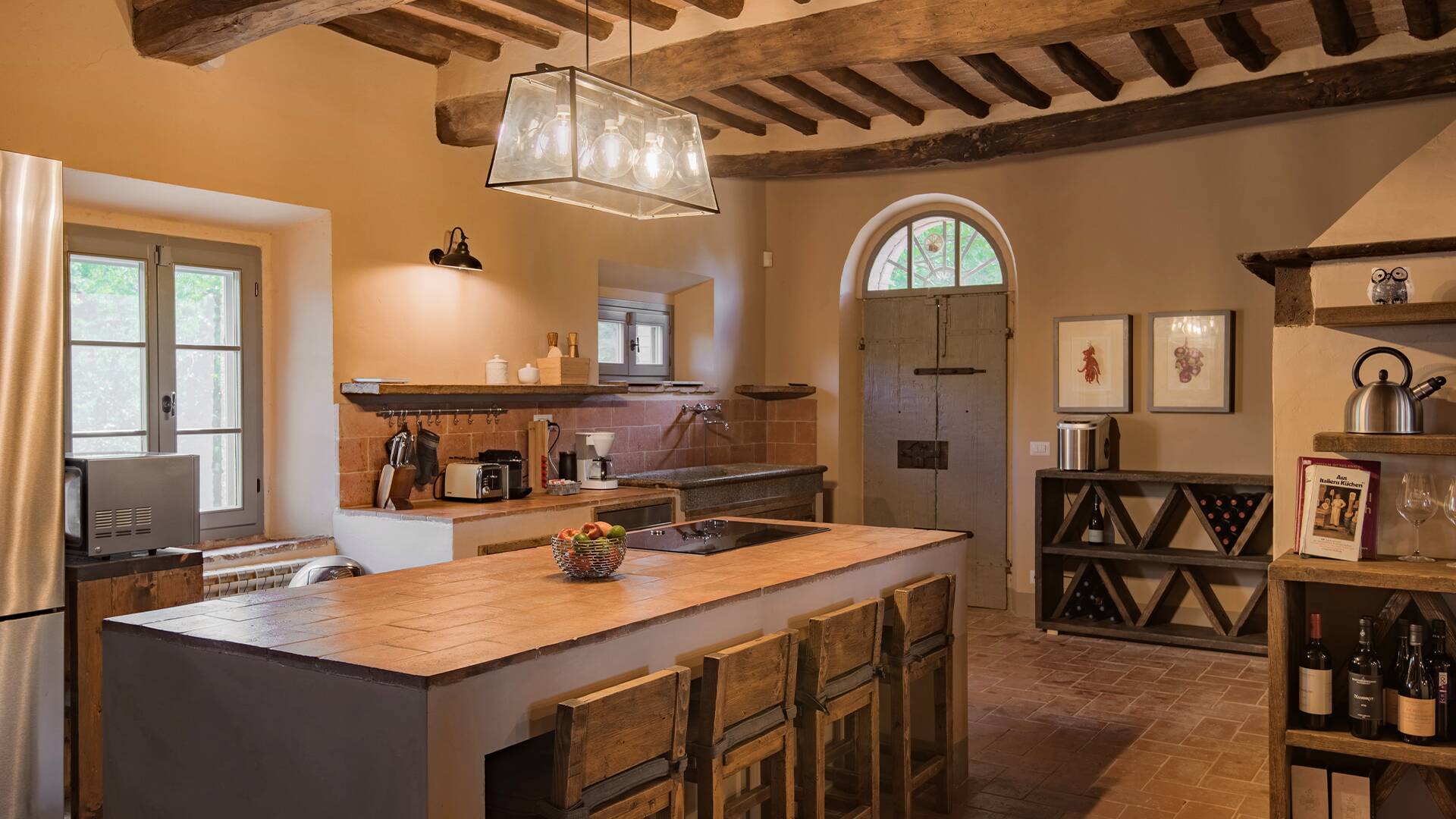 first floor, kitchen with counter and stools