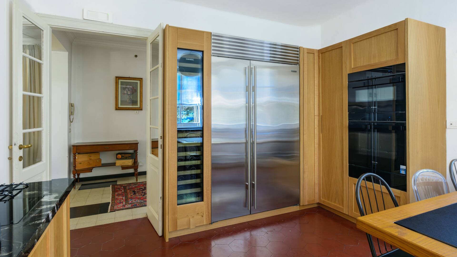 ground floor, fully equipped kitchen with dining table