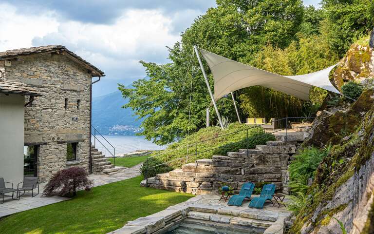 private swimming pool with covered area