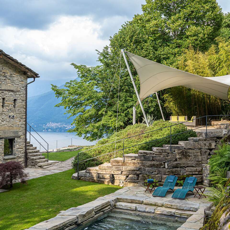 private swimming pool with covered area