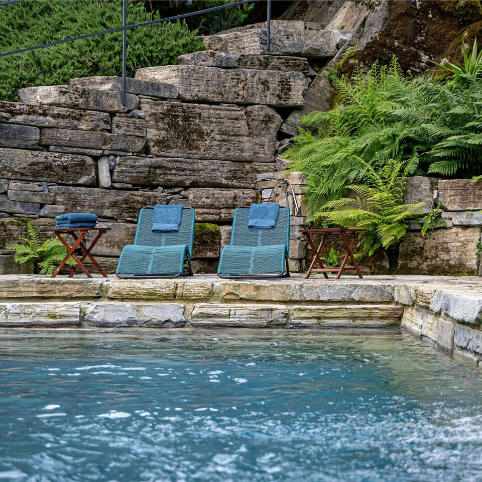 private pool with deckchairs
