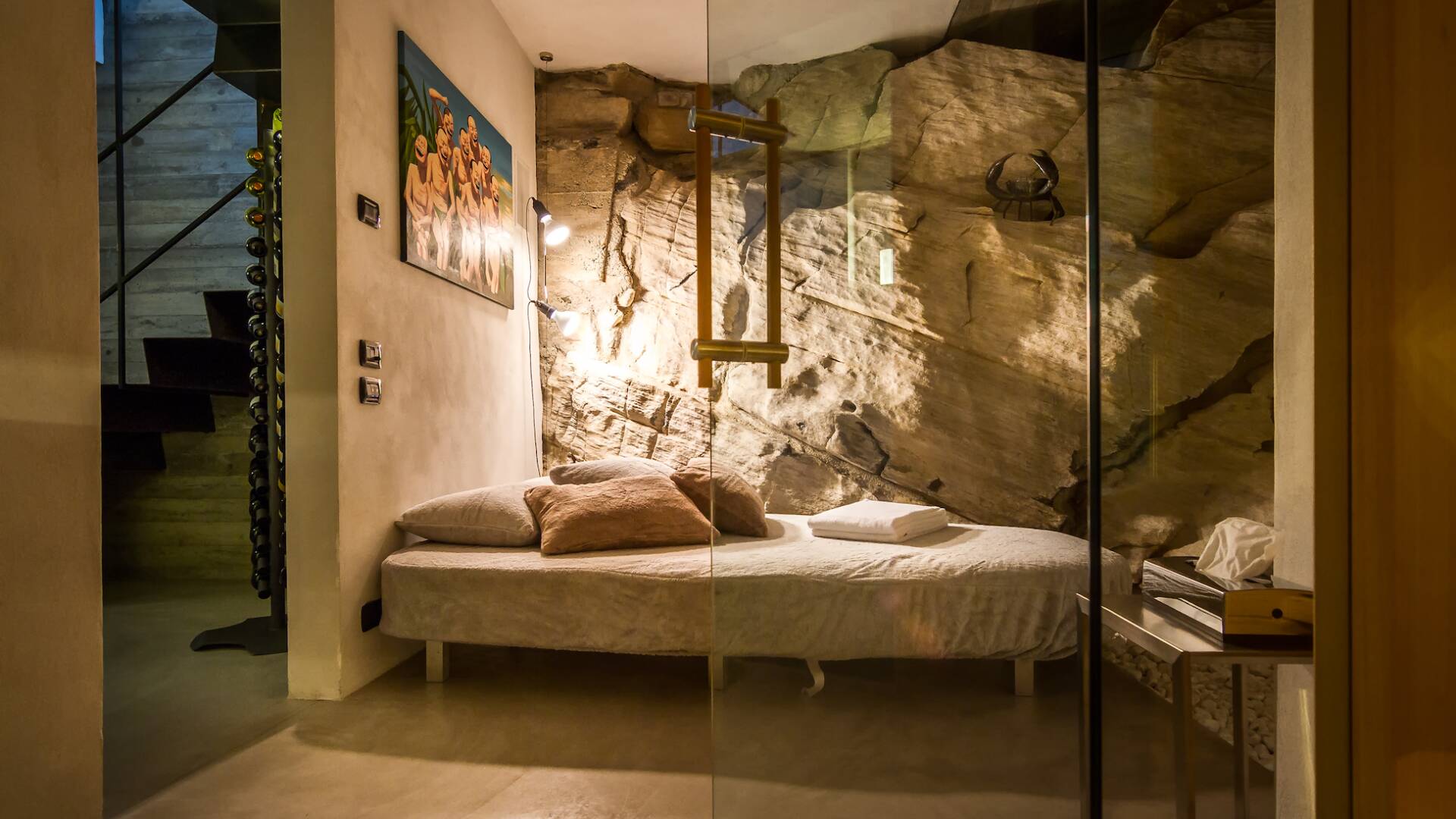 bedroom with rock walls