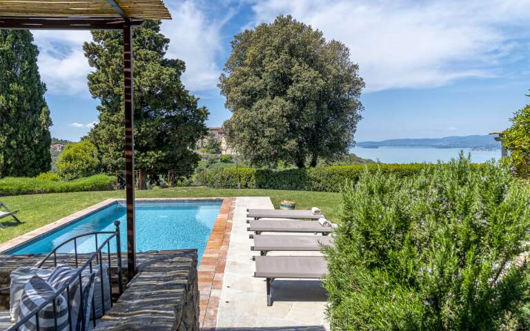 private swimming pool with lake view