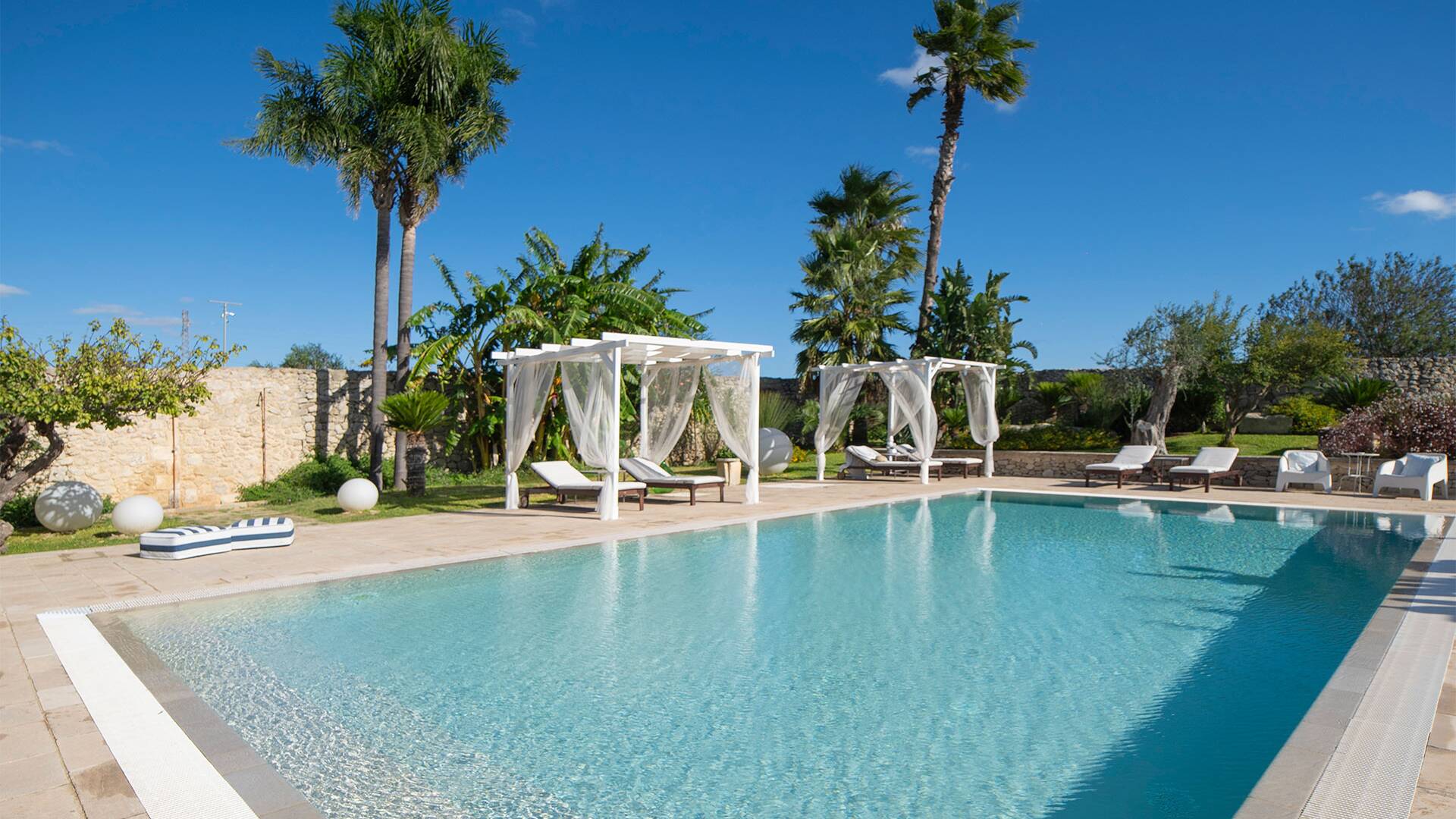 swimming pool and sun bathing area