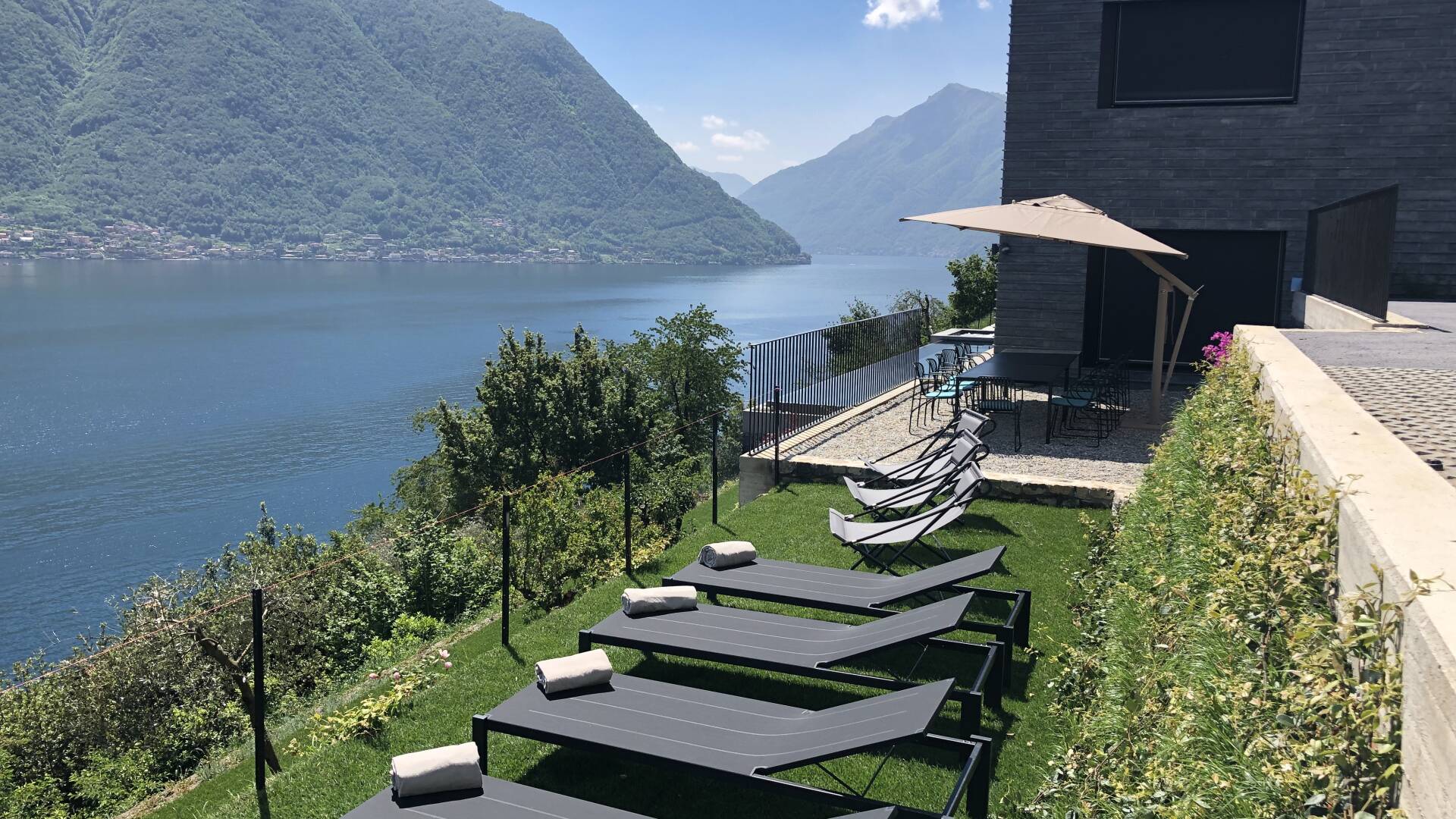 outdoor lounge area with lake view