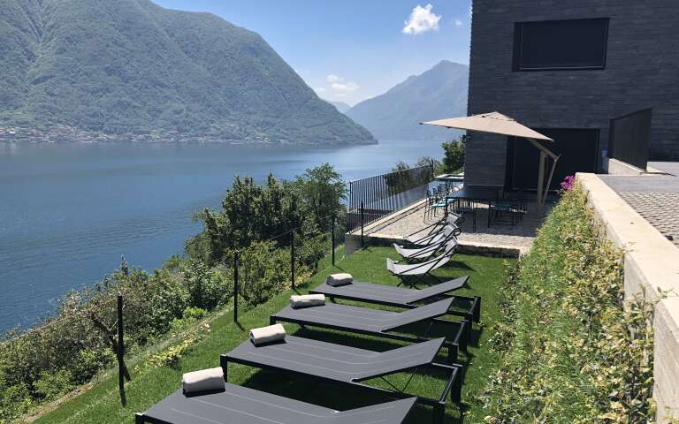 outdoor lounge area with lake view