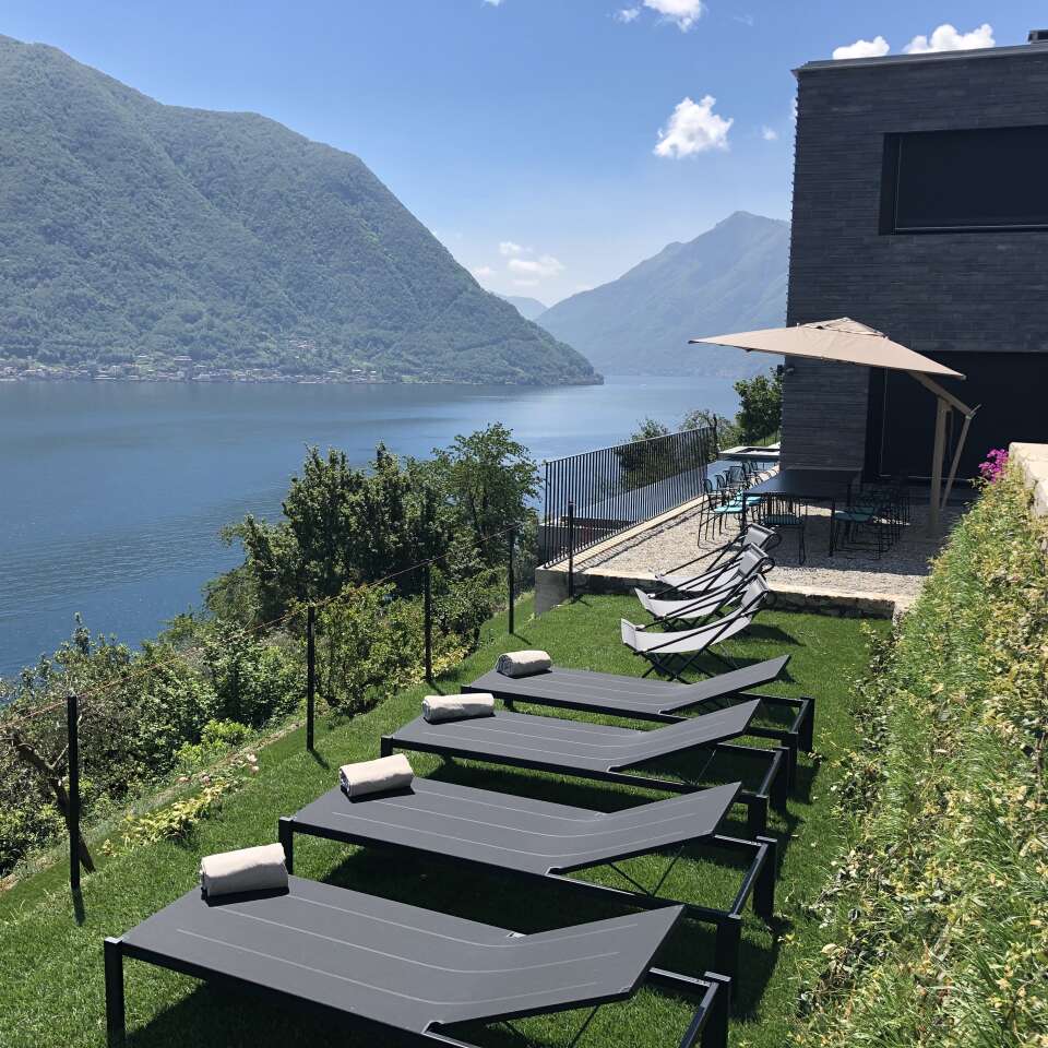 outdoor lounge area with lake view
