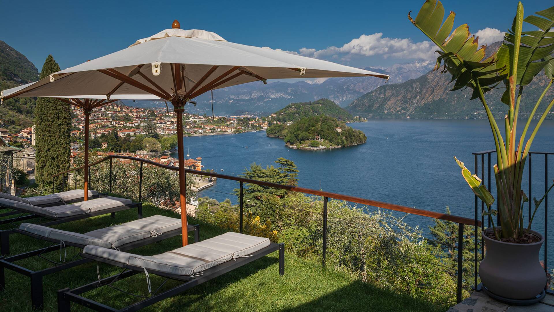 terraced garden with lounge area and lake view
