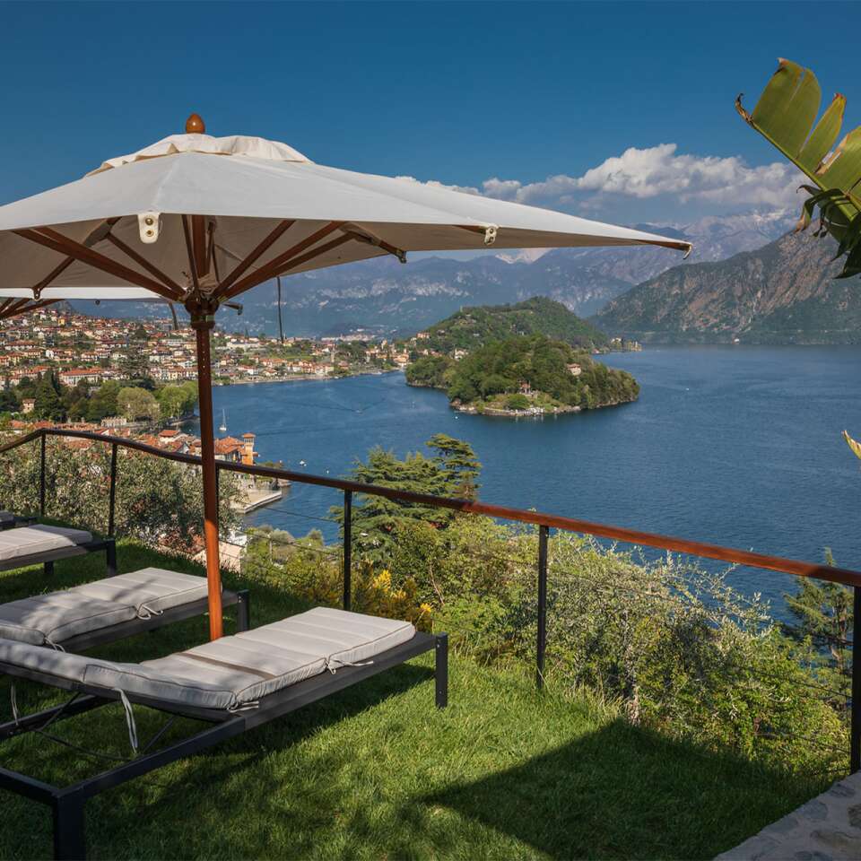 terraced garden with lounge area and lake view