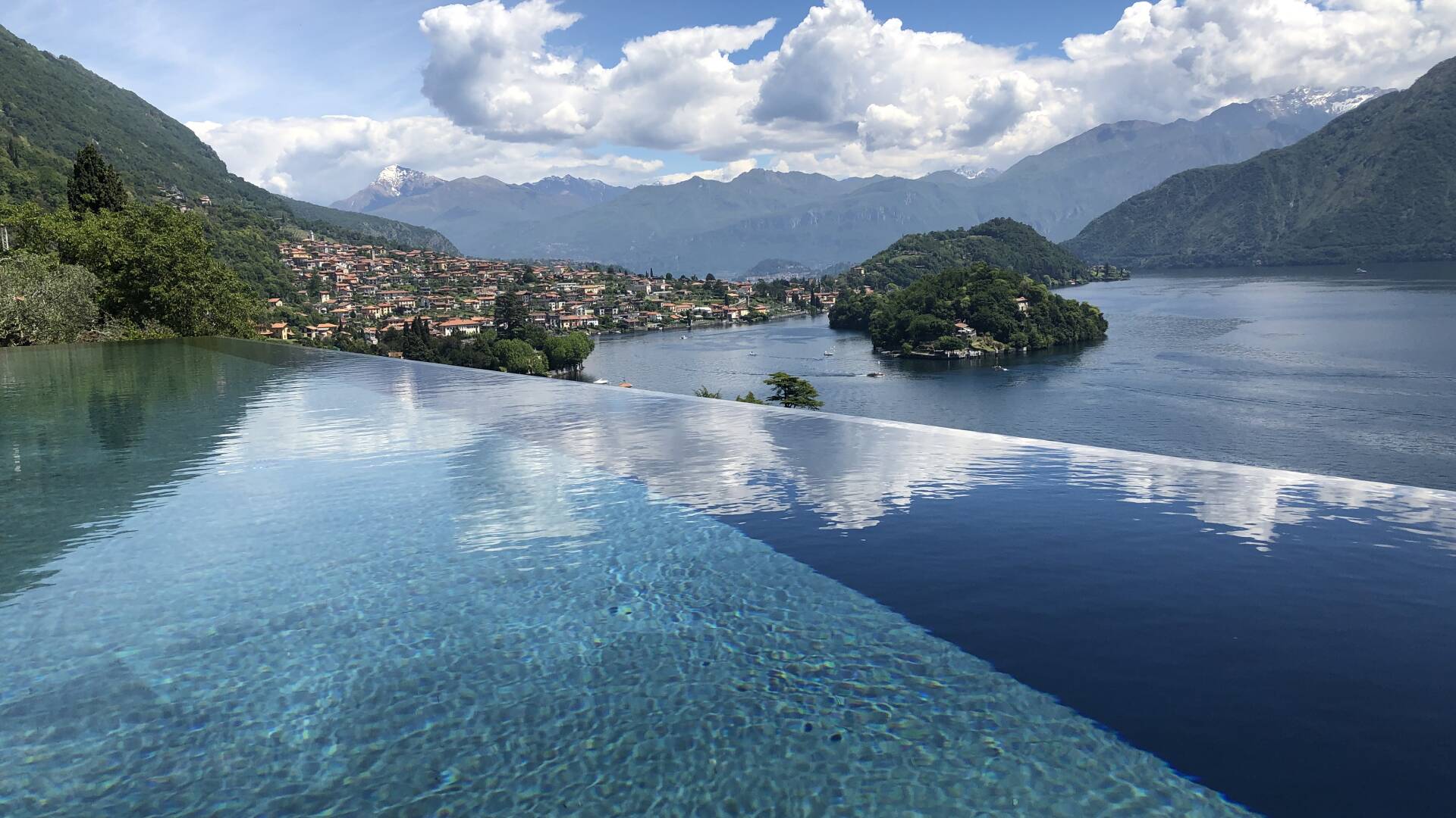 private infinity swimming pool with lake view