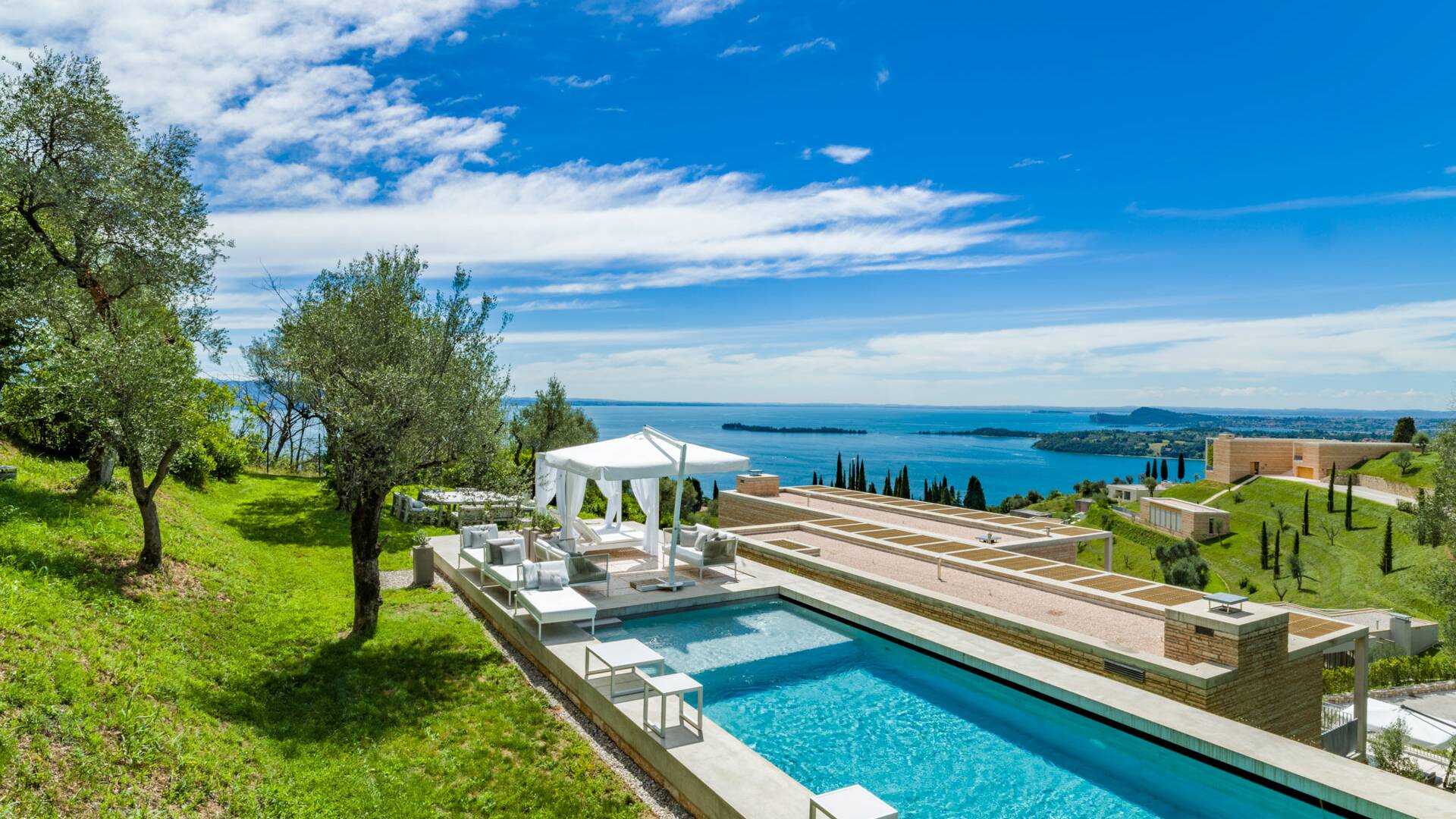 luxury swimming pool with view on Garda lake