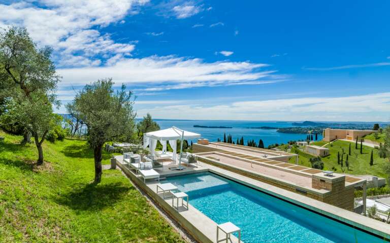 luxury swimming pool with view on Garda lake