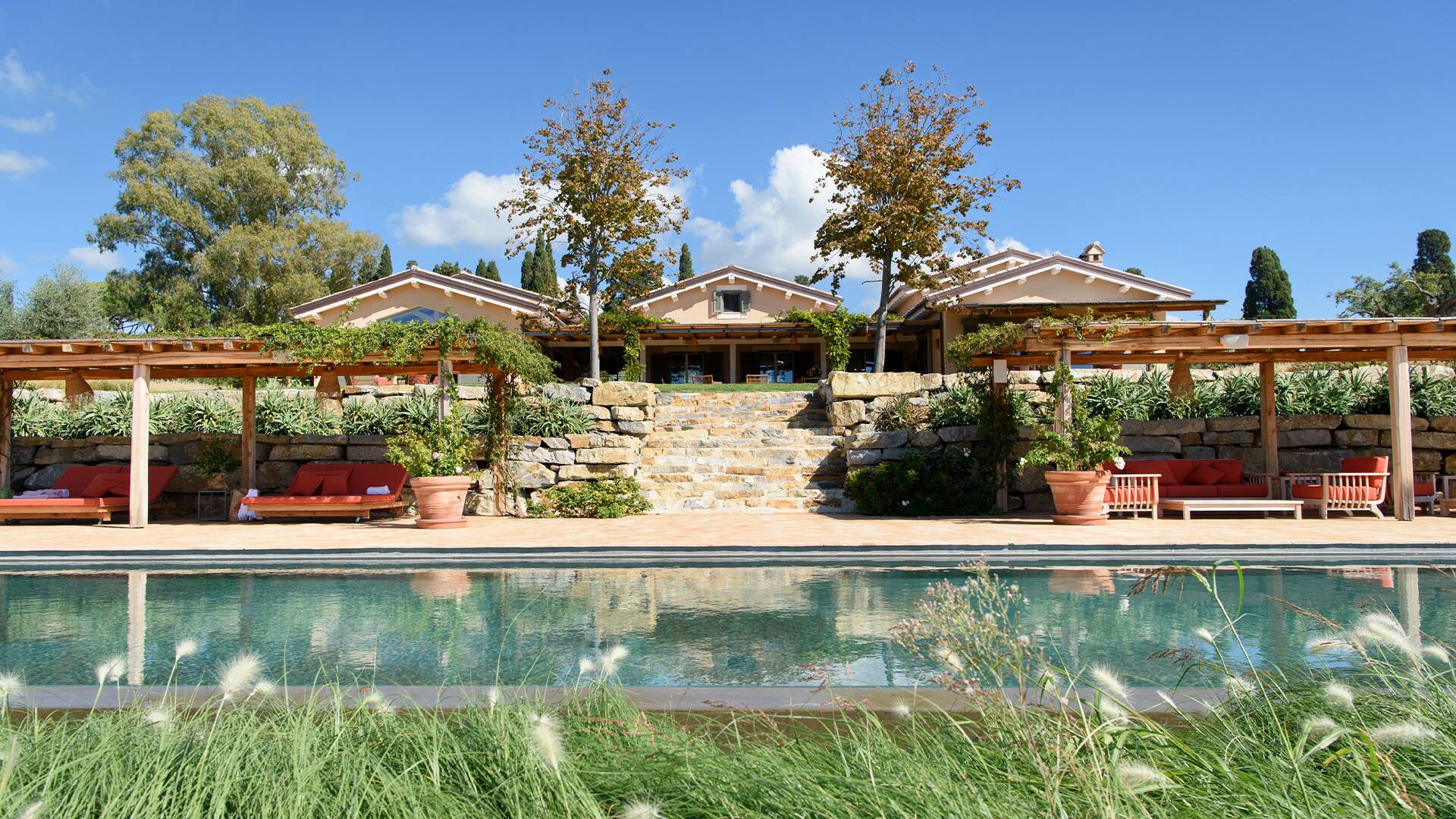 luxury swimming pool and sun loungers