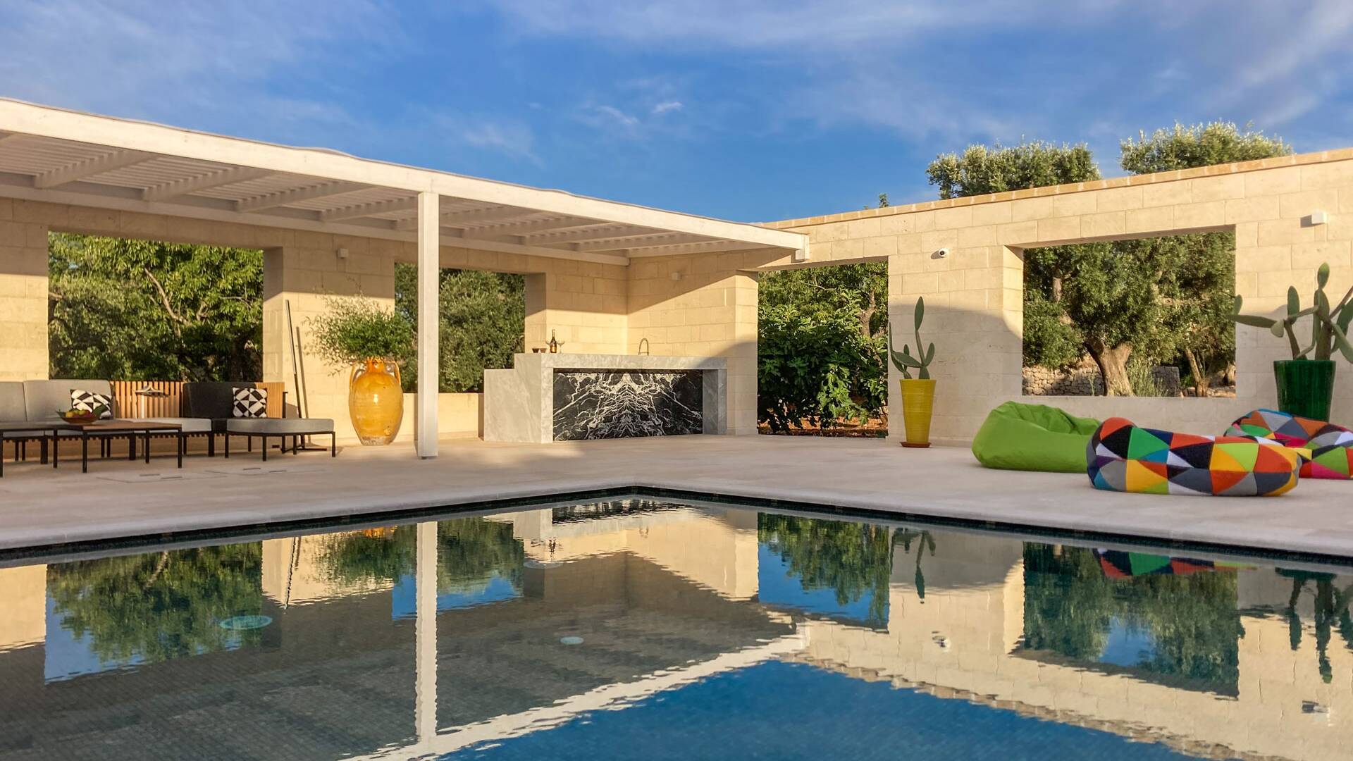 private swimming pool with sunbathing area