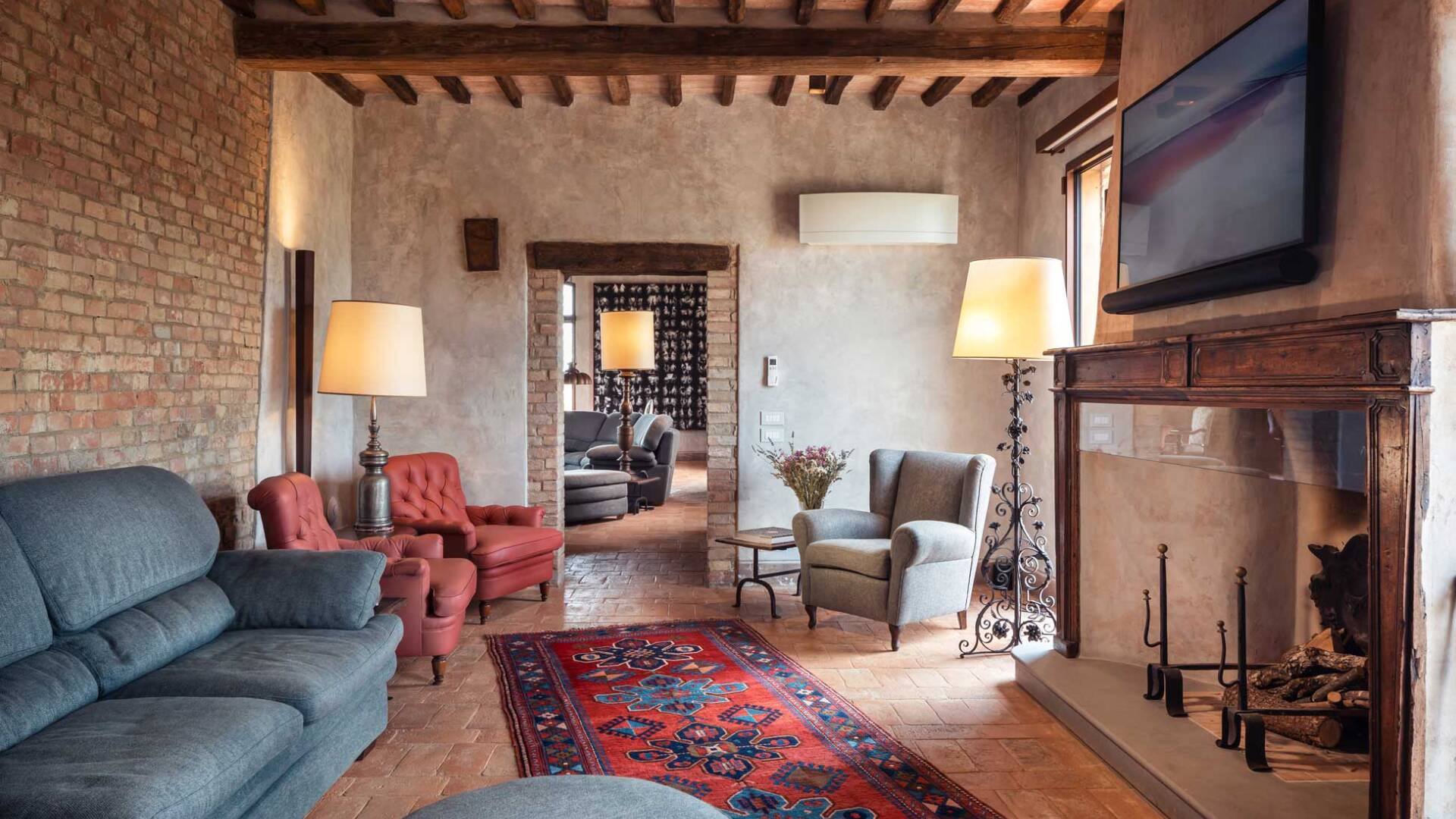 living room with fireplace and TV