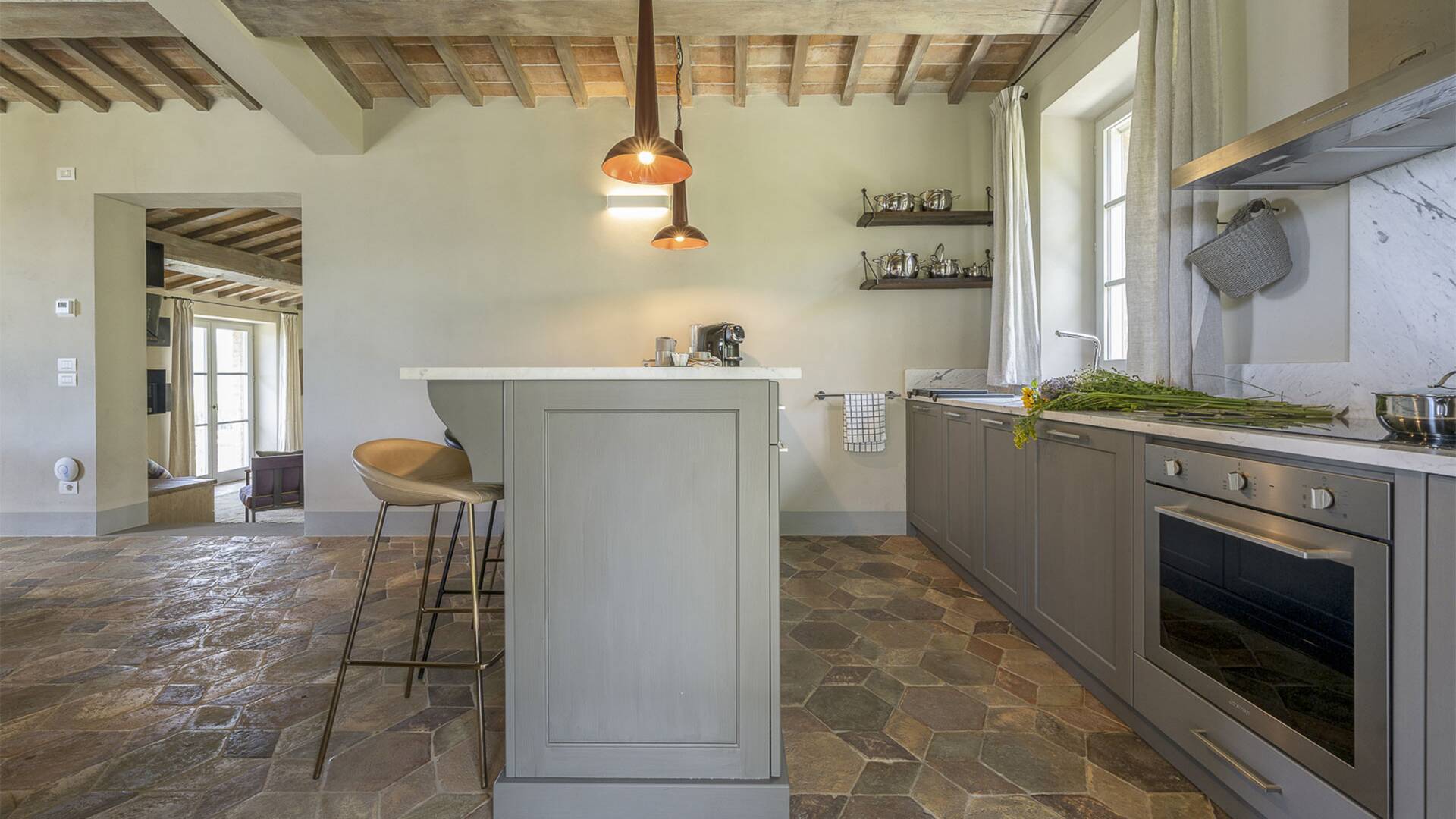 modern kitchen with counter and stools