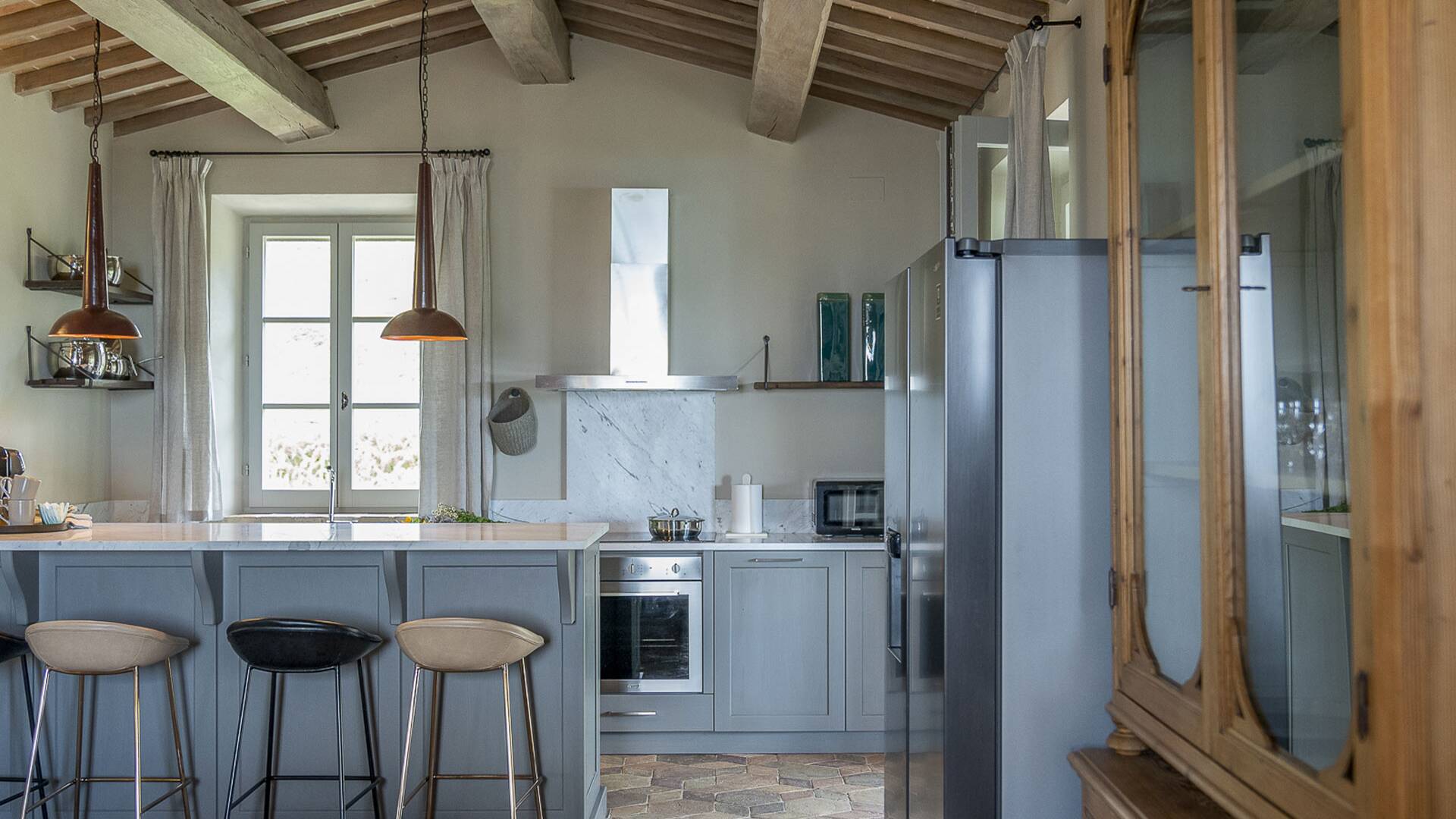 kitchen counter with stools