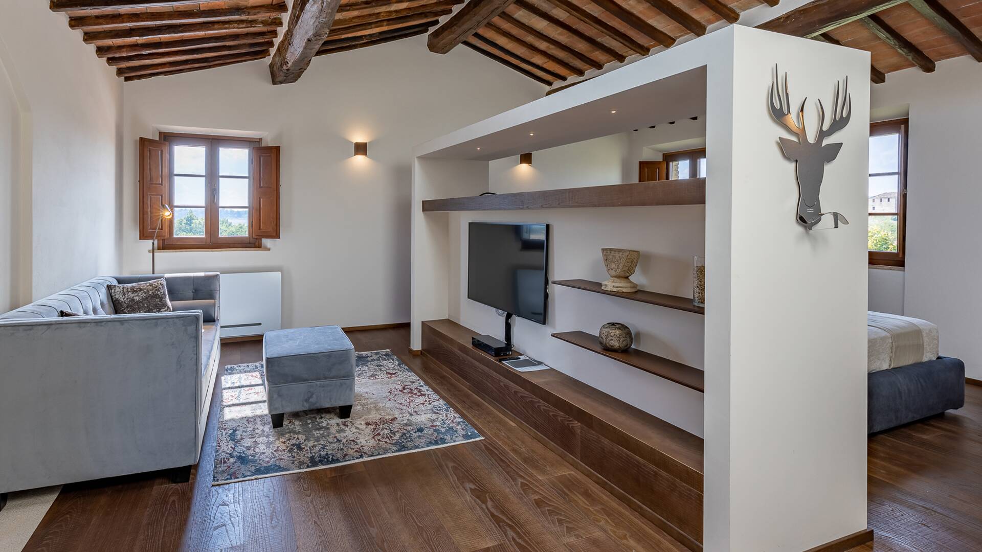 double bedroom with sitting area and TV