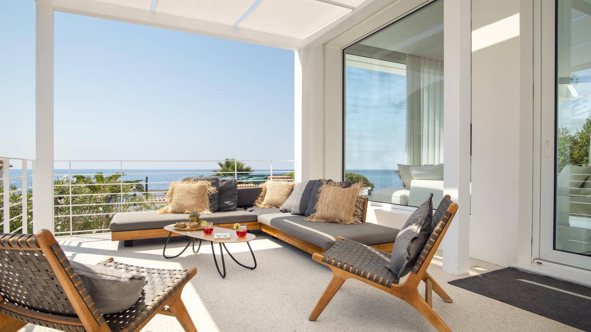 lounge area in front of the entrance of the villa