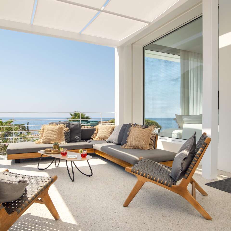 lounge area in front of the entrance of the villa