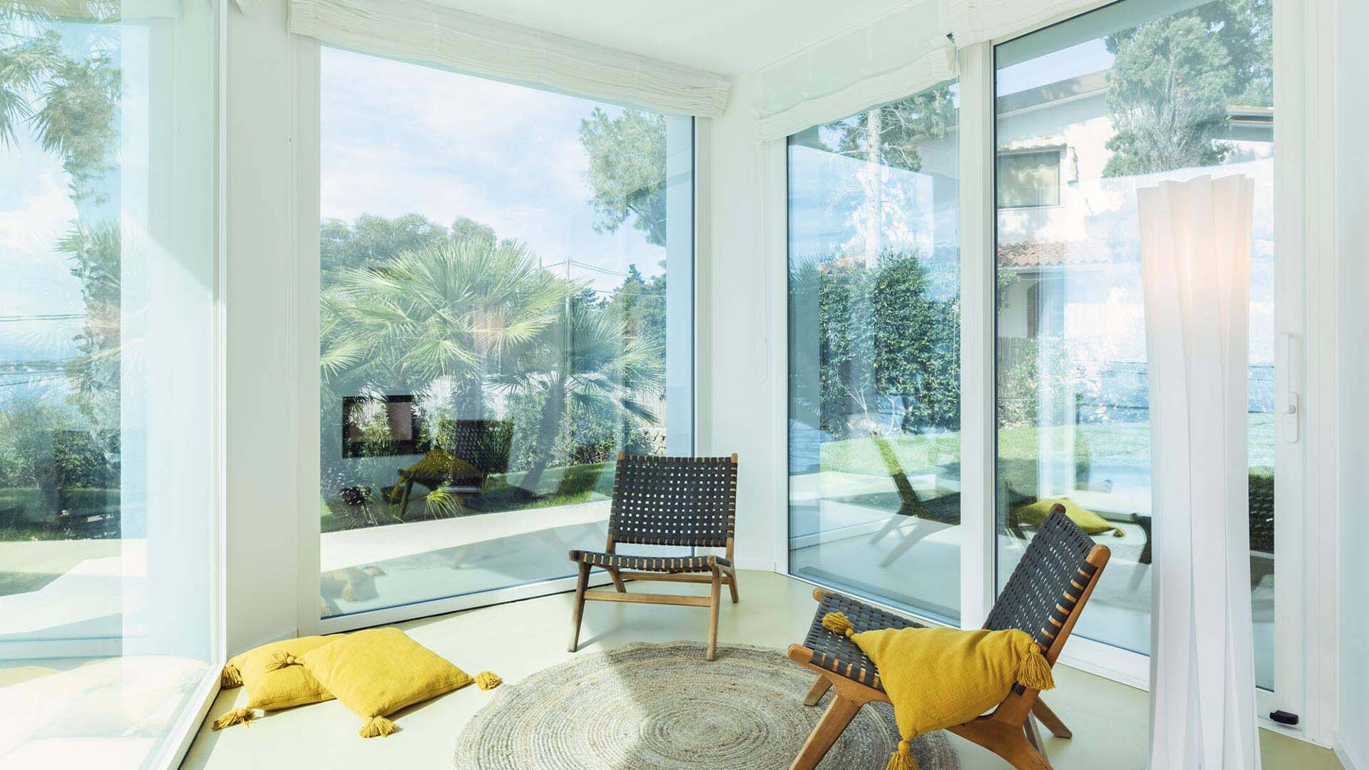 living room with French windows opening to outdoor 