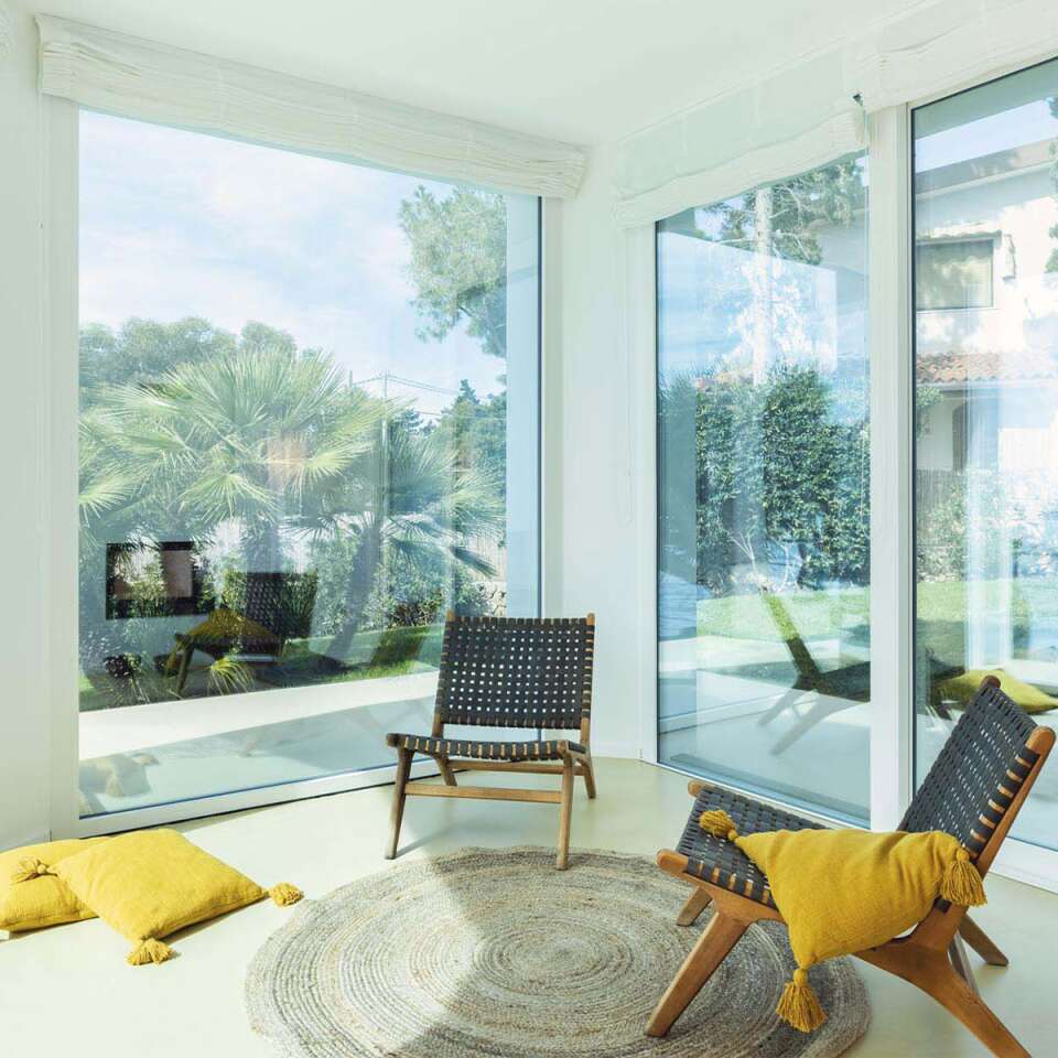 living room with French windows opening to outdoor 