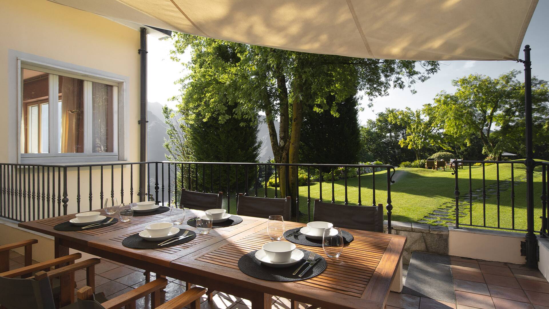 lovely covered pergola with dining table