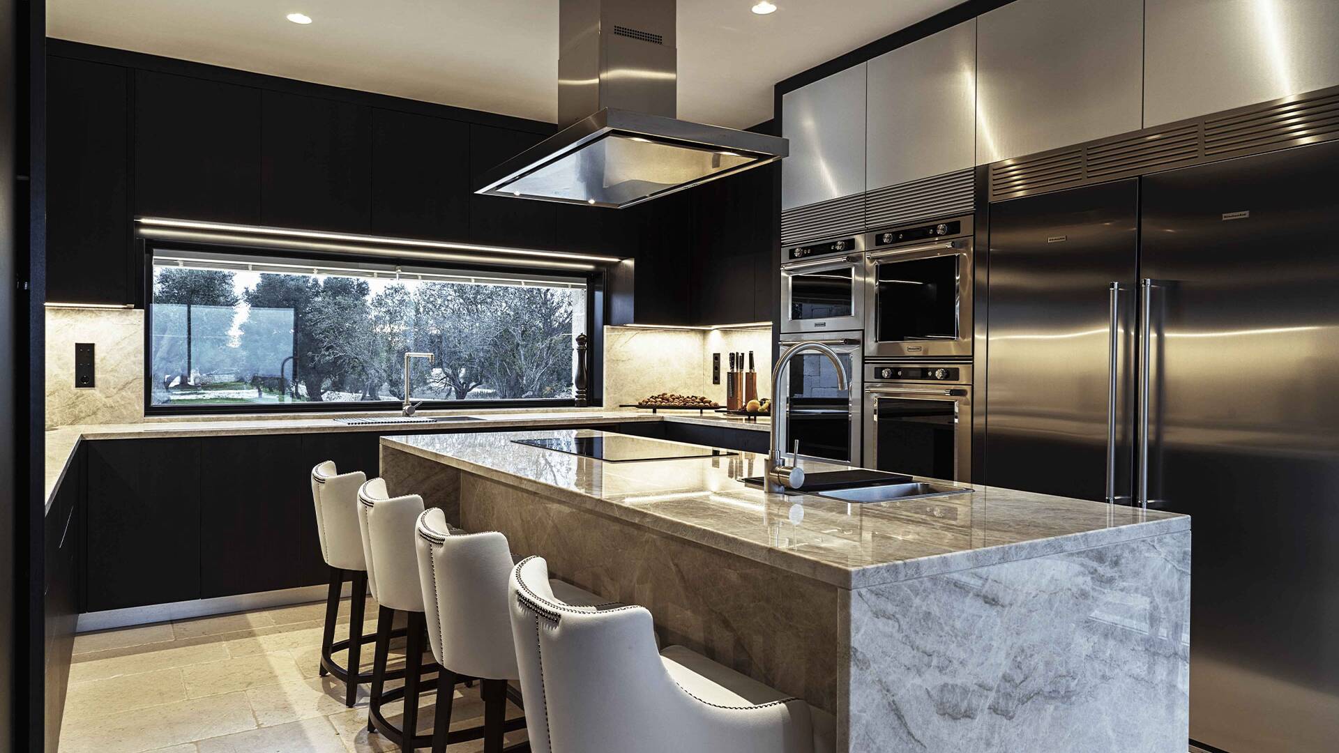 kitchen, marble counter and stools