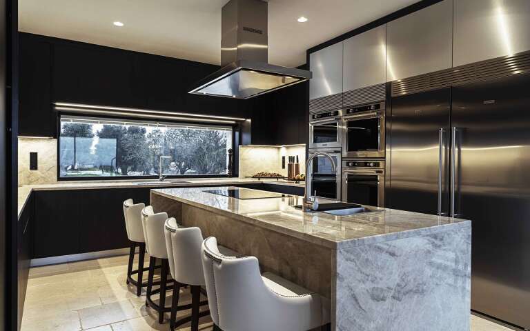 kitchen, marble counter and stools