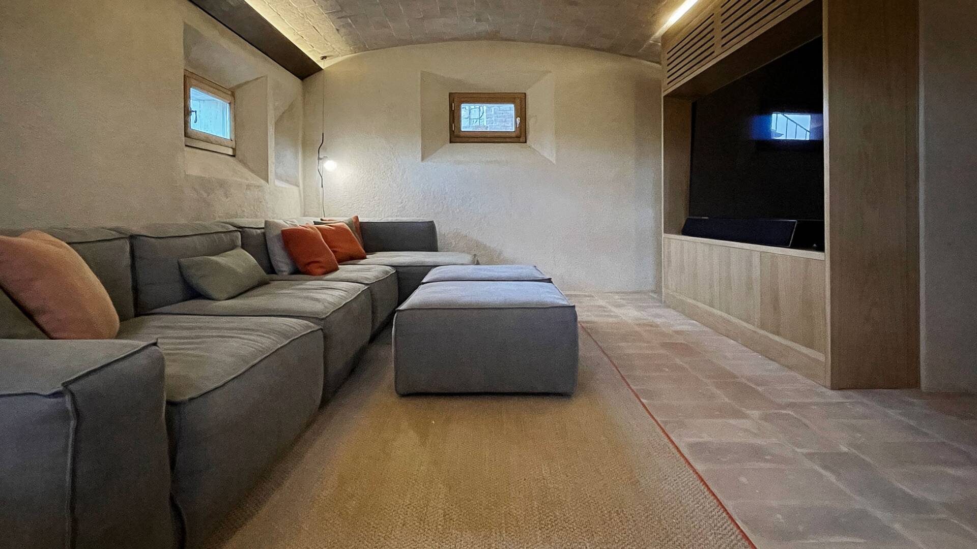 cosy TV room with sofas