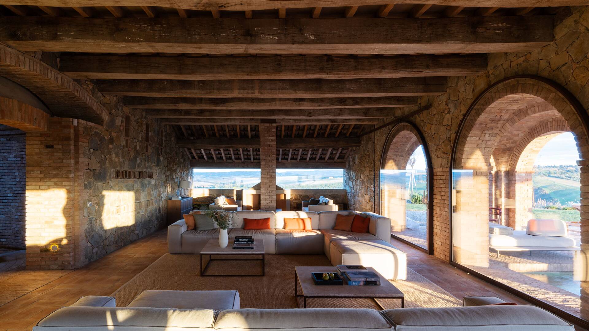 bright living room with floor-to-ceiling windows