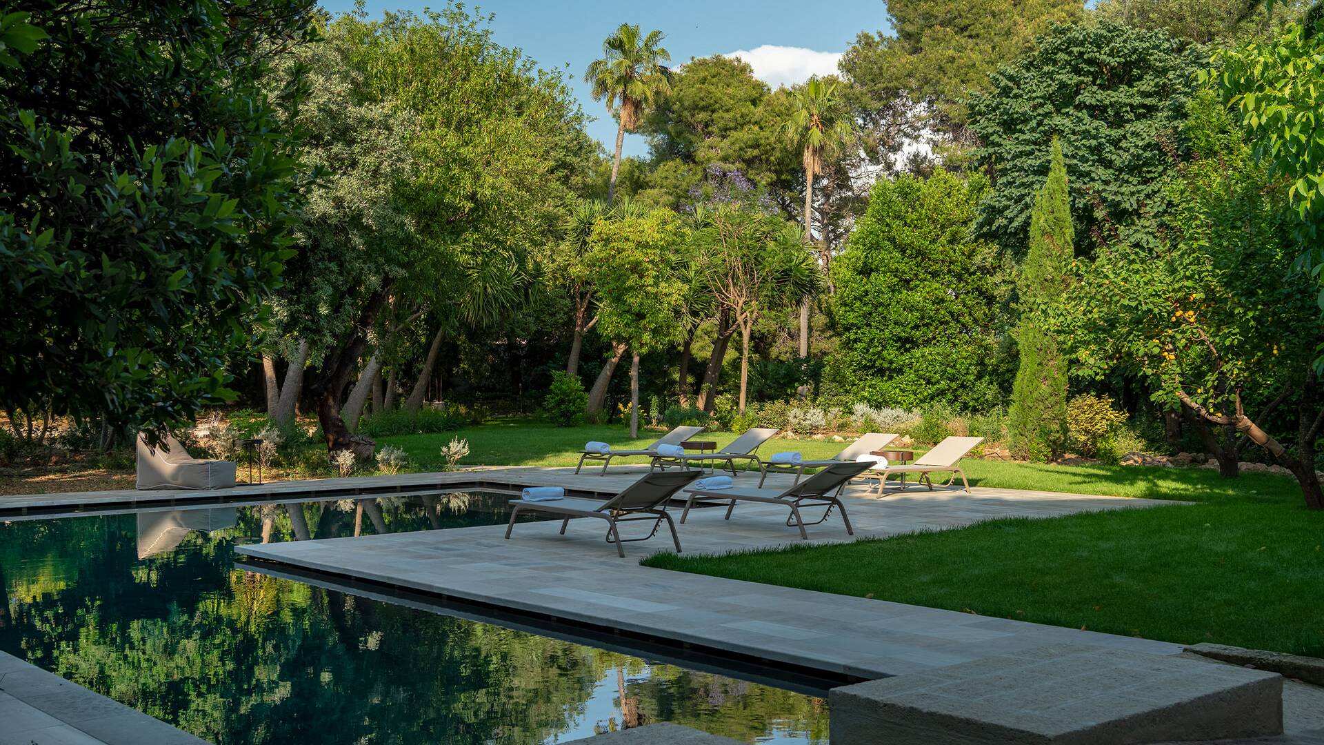 sunbathing area around the pool