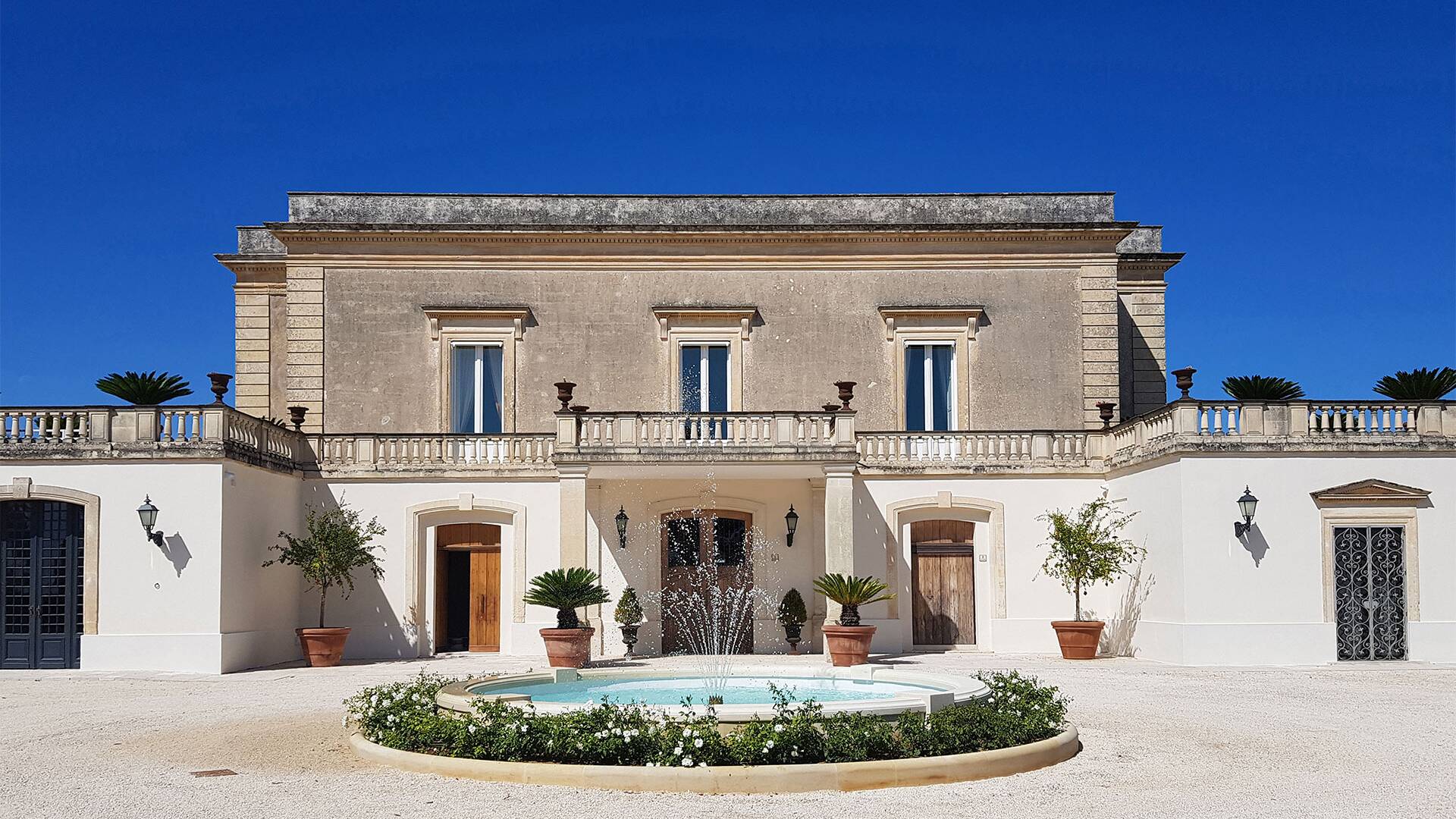 outdoor entrance with fountain