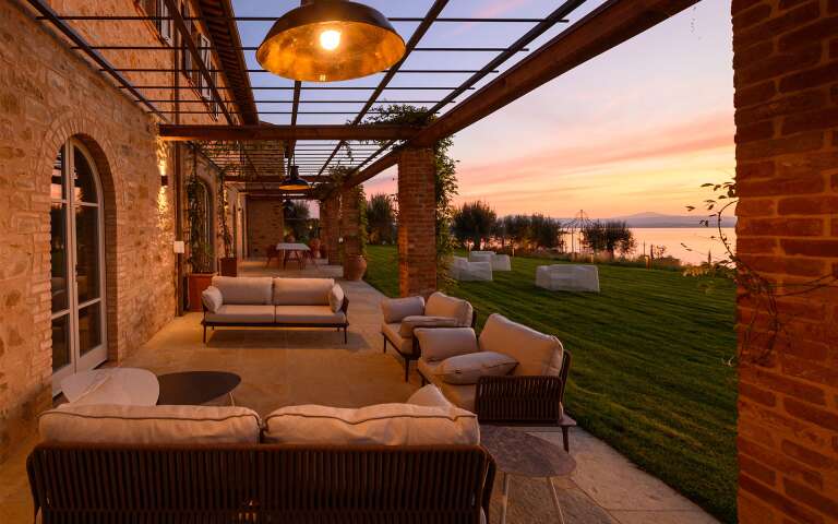 outdoor sitting area with lake view