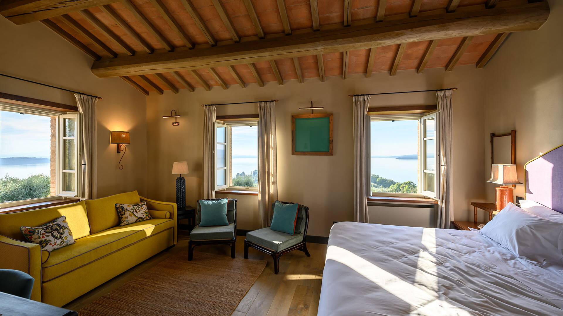 luxury bedroom with view over Lake Trasimeno
