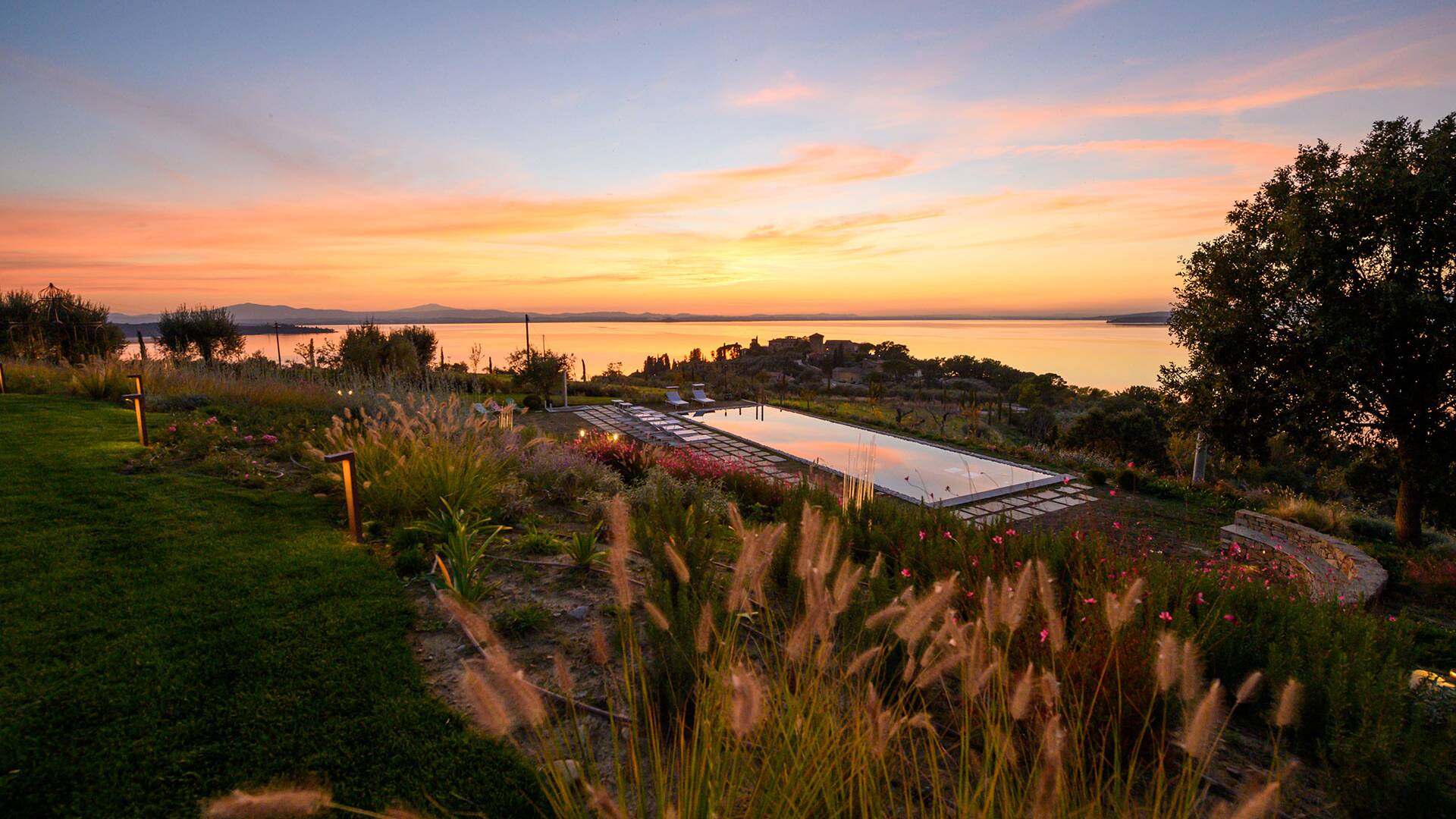 sunset by the private infinity swimming pool