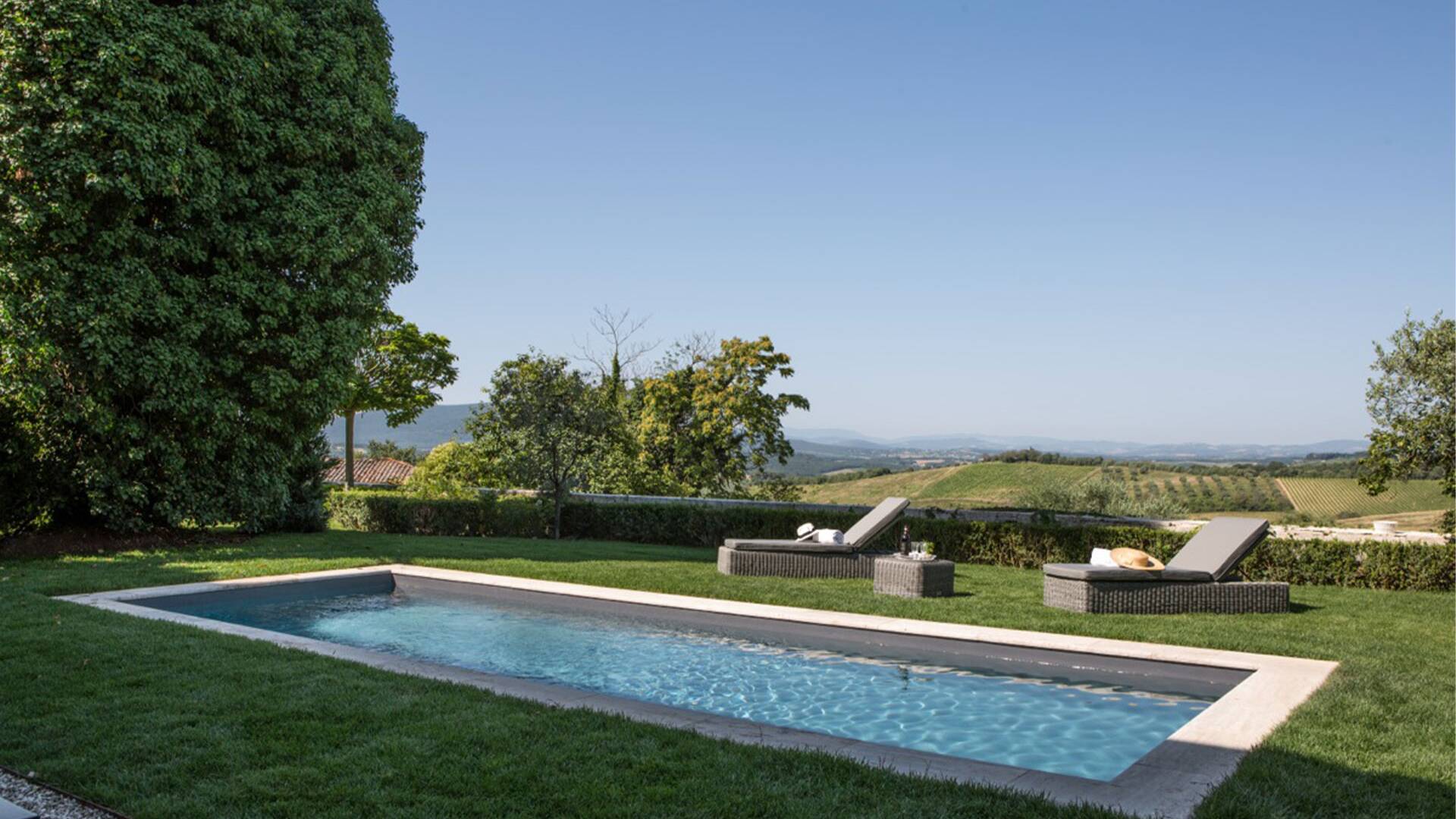 sun loungers by the pool