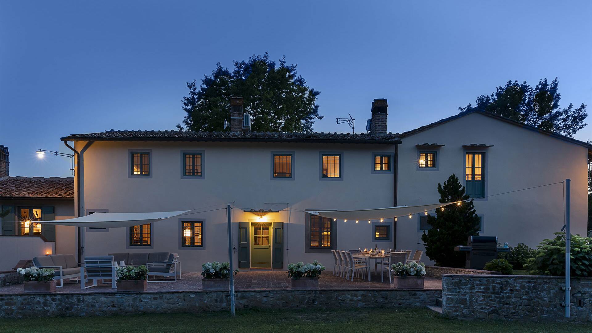 cosy pergola and sitting area by night