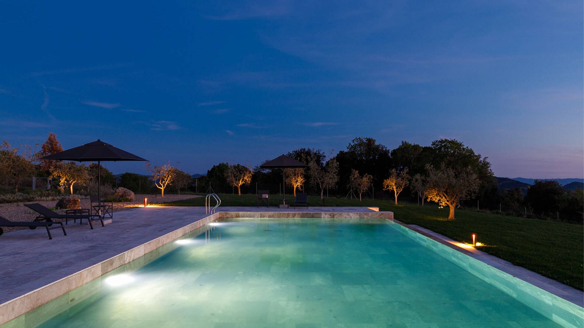 infinity swimming pool by night