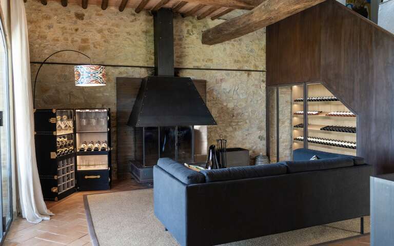 charming sitting area with fireplace and wine fridge