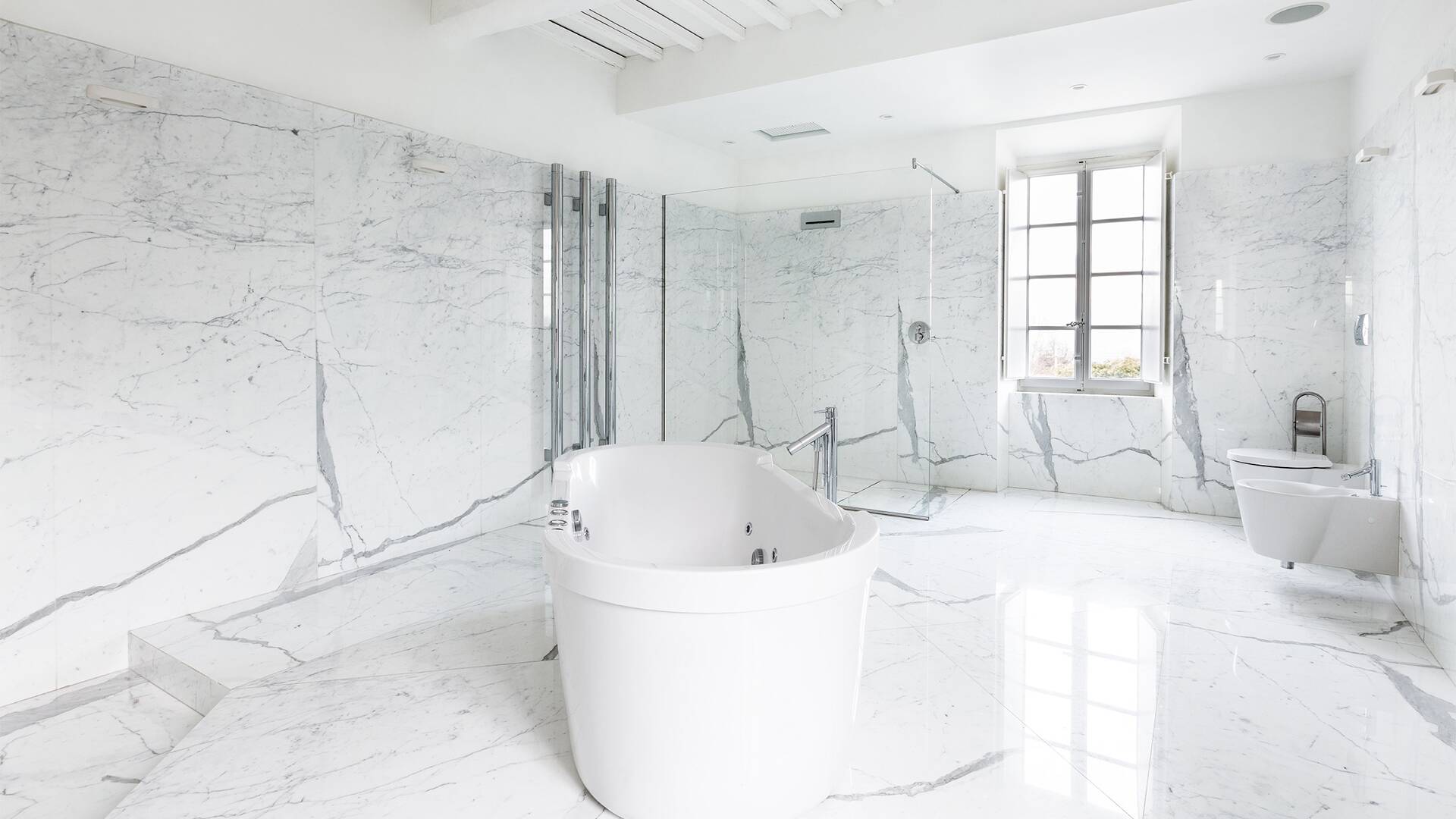 luxury marble bathroom with bathtub